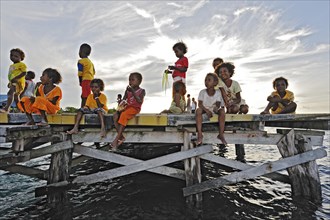 Children on a jetty