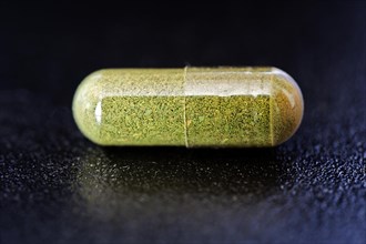Moringa powder in a capsule