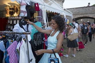 Woman shopping at the Summer Jamboree Rock'n'Roll Festival