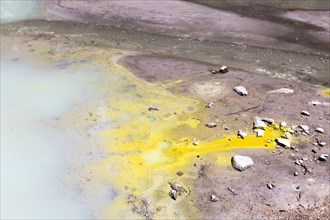 Sulphurous water flowing in a lake