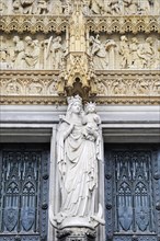 Statue of Virgin Mary and the Child Jesus at the entrance portal