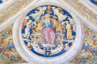 Creator enthroned among angels and cherubs