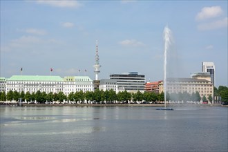 View over the Inner Alster Lake with Alster Fountain towards the street of Neuer Jungfernstieg