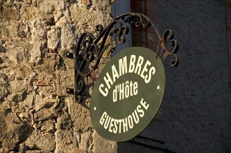 Hanging sign of a guesthouse, Carcassonne