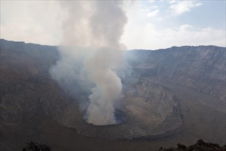 Smoking crater of Mount Nyiragongo volcano