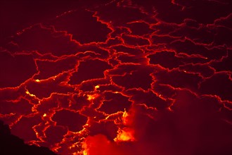 Boiling lava lake in the crater of Mount Nyiragongo volcano