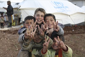 Children in a camp for Syrian refugees of the civil war near the Turkish border