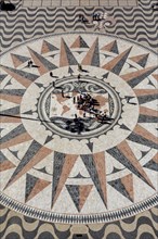 Large compass in the paving in front of the Monumento a Los Descubrimientos