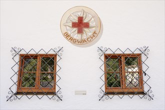 Windows and the logo of the Bergwacht Mountain Rescue Service