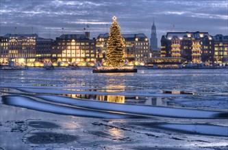 Binnenalster or Inner Alster Lake with a Christmas tree and Jungfernstieg