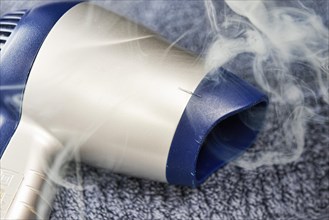 Smoke coming from a hairdryer