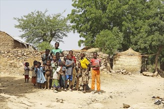 Group of children singing a song of welcome