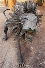 Life-size lion figure made of metal