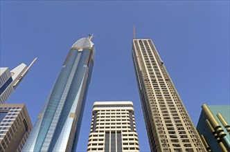Skyscrapers on Sheikh Zayed Road against a blue sky