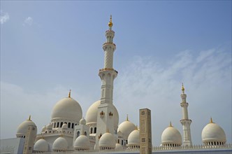 The white marble domes and minarets of Sheikh Zayed Grand Mosque