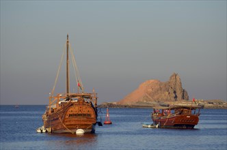 Two dhows in the harbor