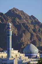 Rasool Azam Mosque in front of the rocky mountains that surround the city at back