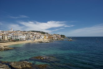 Village with a sandy beach on the sea