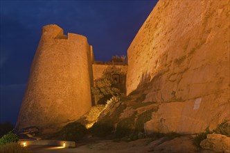 The flood-lit citadel of Calvi at the blue hour after sunset. Calvi is in the department Haute-Corse
