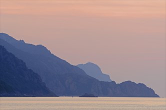 The Gulf of Porto with the surrounding mountains at sunset