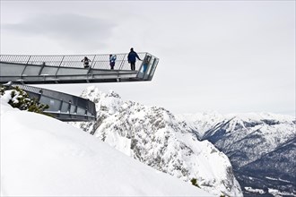 AlpspiX viewing platform in winter with a panoramic mountain views