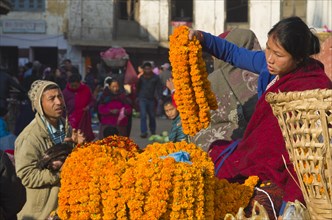 Street vendor selling flower garlands at Durbar Square