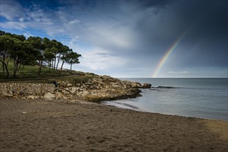 Beach and rainbow