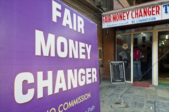 Advertisement sign of a 'fair money changer'
