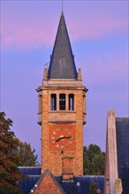 Clock tower of the Fondation Deutsch de la Meurthe building at dawn