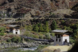 Iron bridge of the temple of Tachogang Lhakhang crossing the Paro Chu River