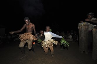 Pygmies of the Bakola people celebrating with song and dance