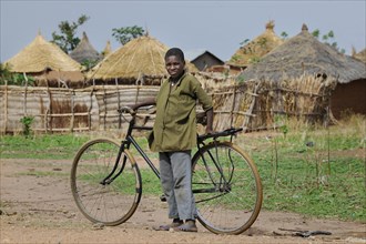 Cyclist in a village