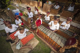 Children and teenagers of a gamelan orchestra at an event