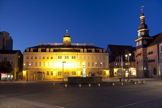 Illuminated City Palace and Town Hall on the market square