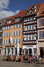 Half-timbered buildings and restaurant in the historic town centre at Domplatz square