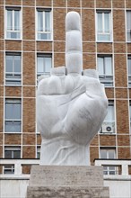 Sculpture 'Crippled Hand' by Maurizio Cattelan at Piazza degli Affari