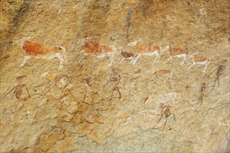 Rock painting of humans and animals in the Tsisab Gorge