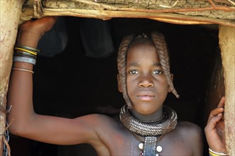 Himba girl with two braids and jewellery