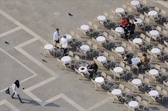 Tables and chairs in St. Mark's Square