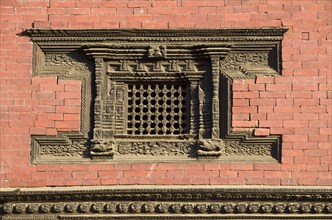 Beautifully carved wooden window of a temple