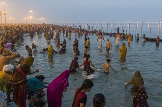 Crowds of people gathering on the Sangam