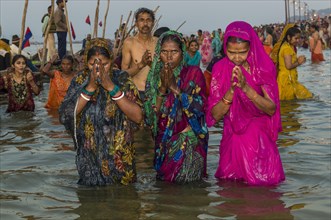 Women taking a bath in the Sangam