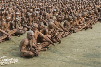Sitting in silence as part of the initiation of new sadhus