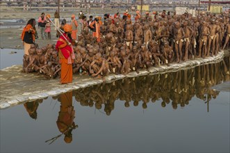 New sadhus getting orders from gurus as part of their initiation