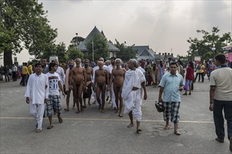 The very rare sight of a group of Jain monks walking naked on Mall Road