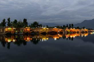 Houseboats on Dal Lake at night