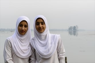 Two Kashmiri women wearing headscarves