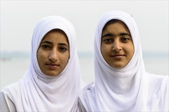 Two Kashmiri women wearing headscarves