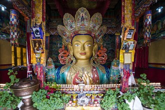 Colourful statue of Maitreya