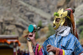 Monk performing ritual mask dance